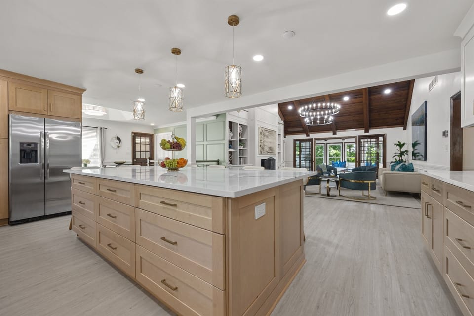 Massive quartz island and open-concept layout — perfect for gathering, prepping, and entertaining in style.