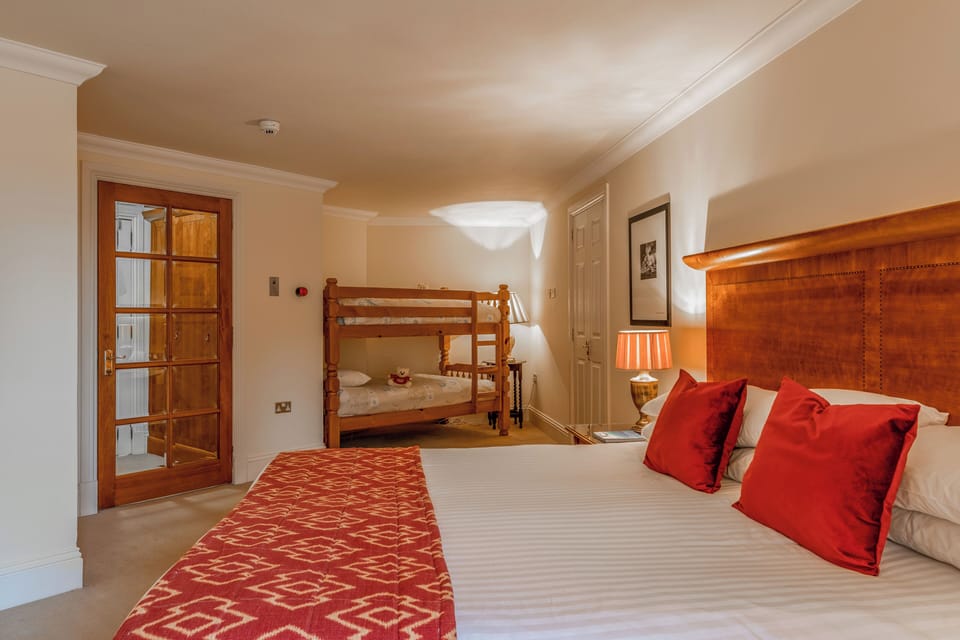 Settle in comfortably with a plush bed and cozy bunks.