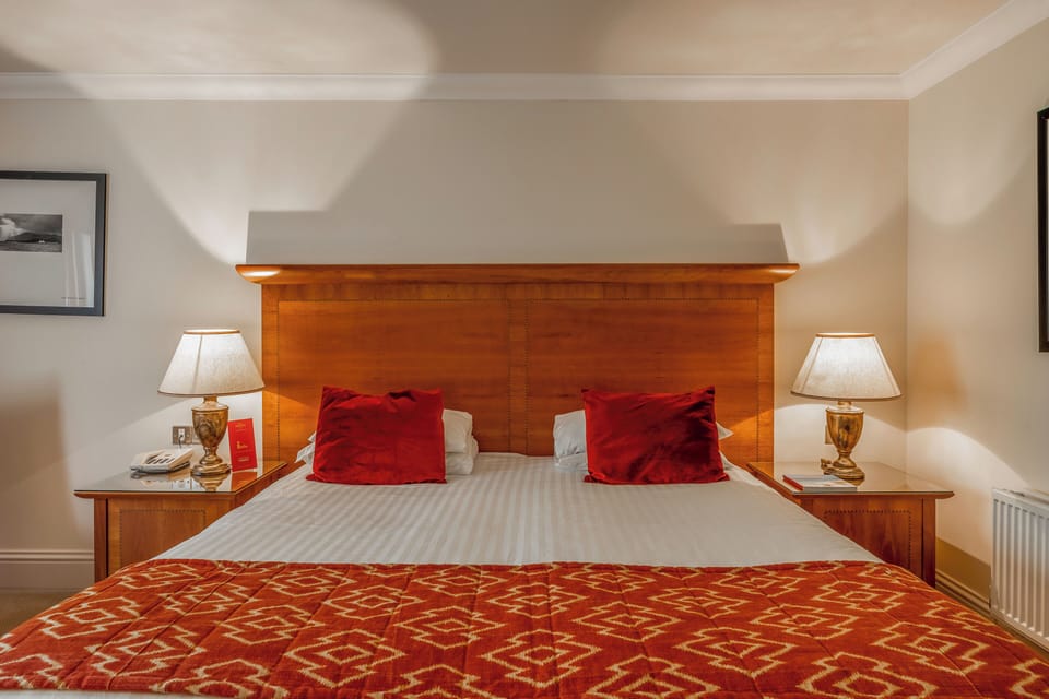 Sink into crisp linens and drift off in quiet comfort.