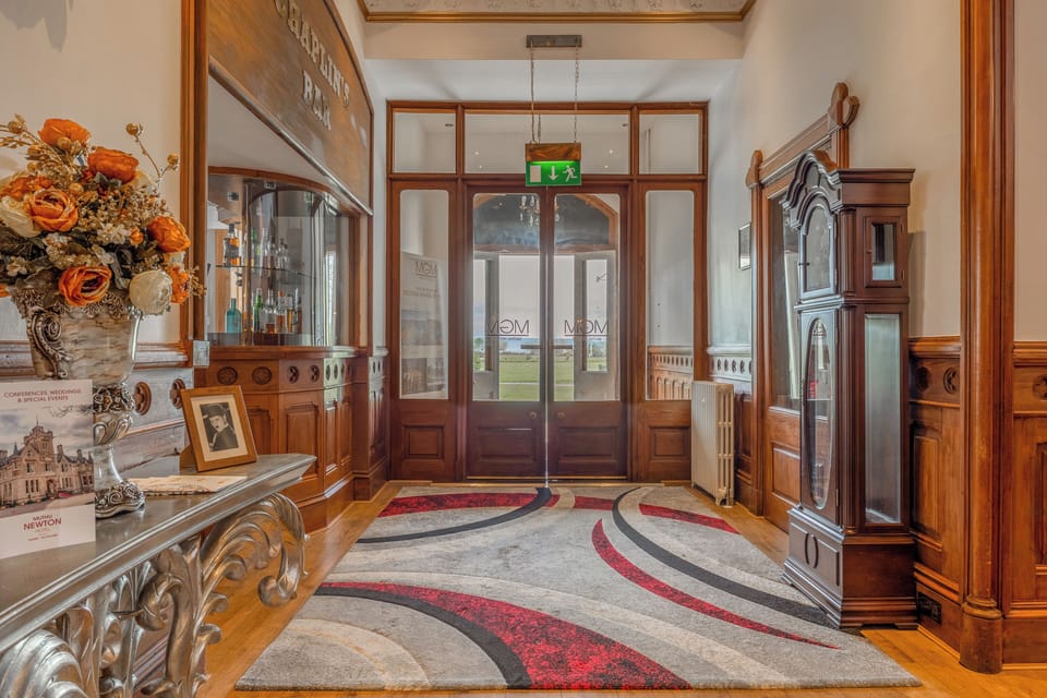 Arrive with ease through bright halls and classic period details.