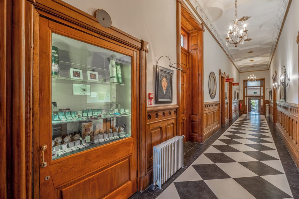Explore the refined corridor lined with wood paneling and charm.
