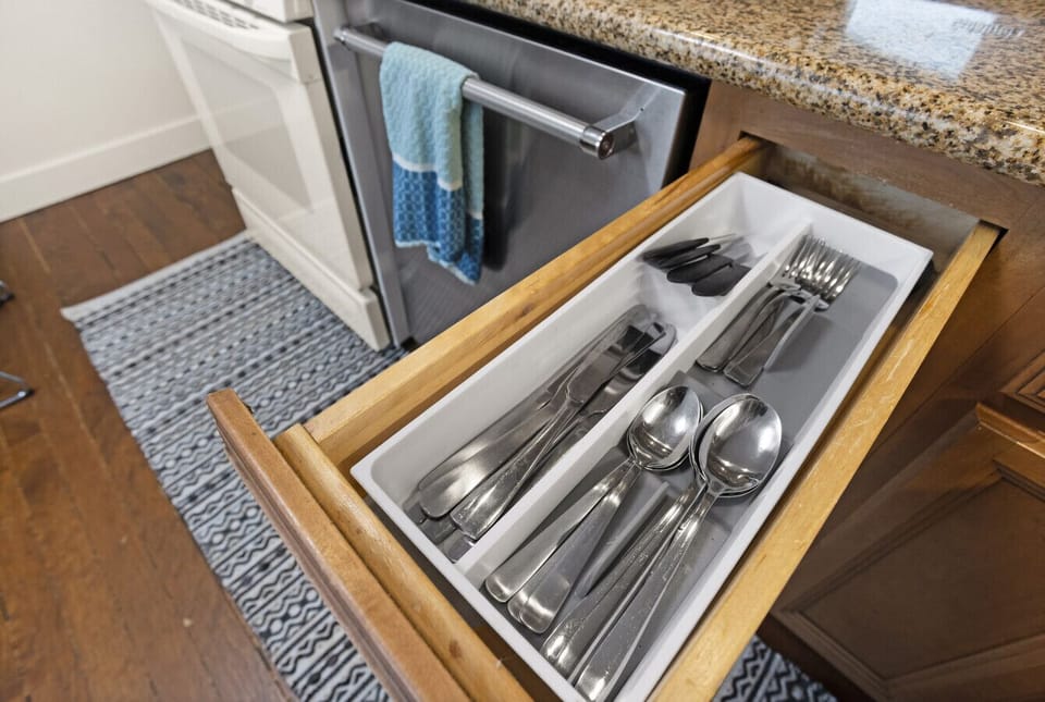 No need to pack utensils—this drawer has everything you need for your meals and morning coffee.