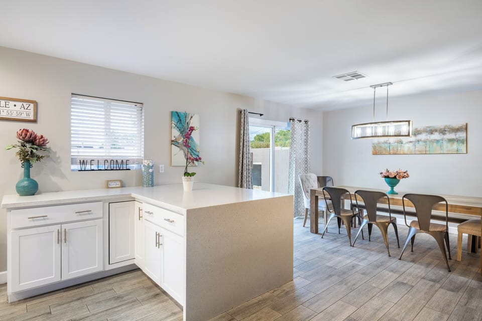 Bright, open-concept kitchen and dining area.