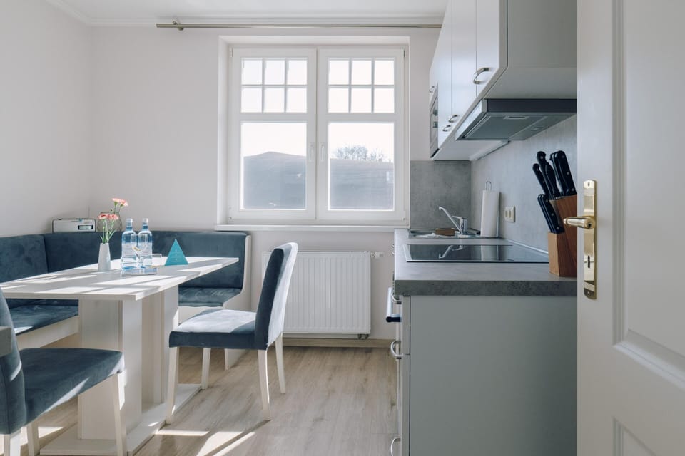 Modern Kitchen with Table and Chairs