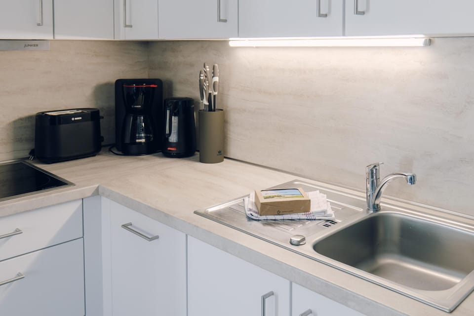 Modern Kitchen with Sink and Coffee Machine