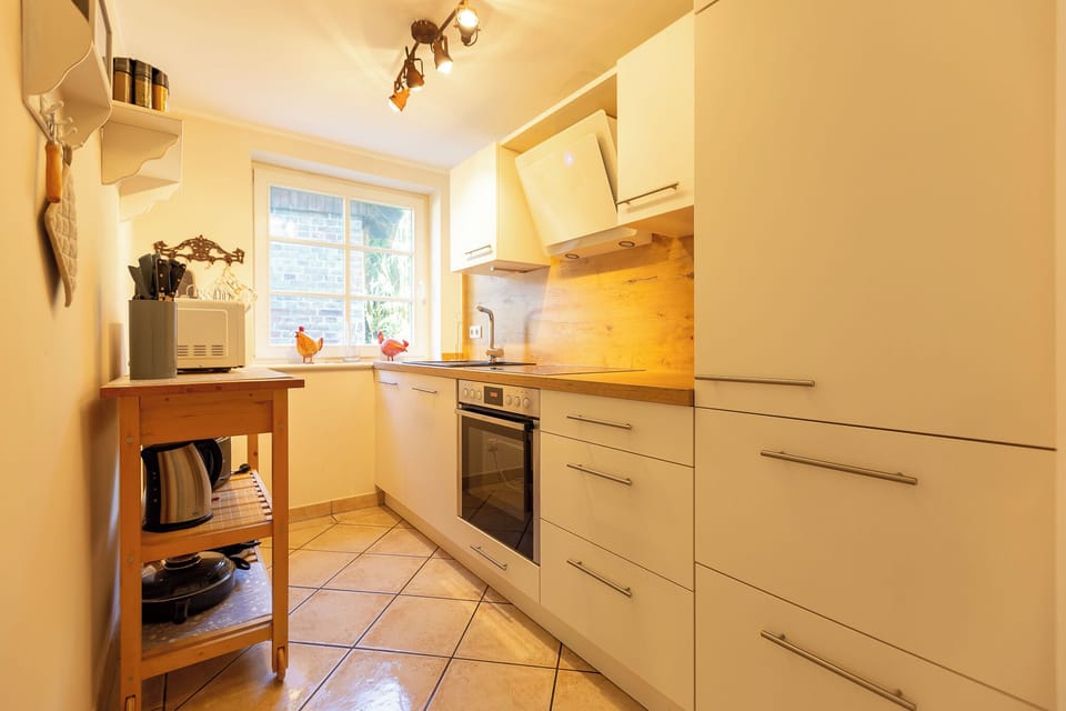 Modern kitchen with appliances and window