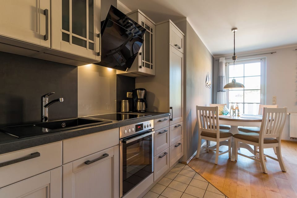 Modern Kitchen with Dining Area and Window