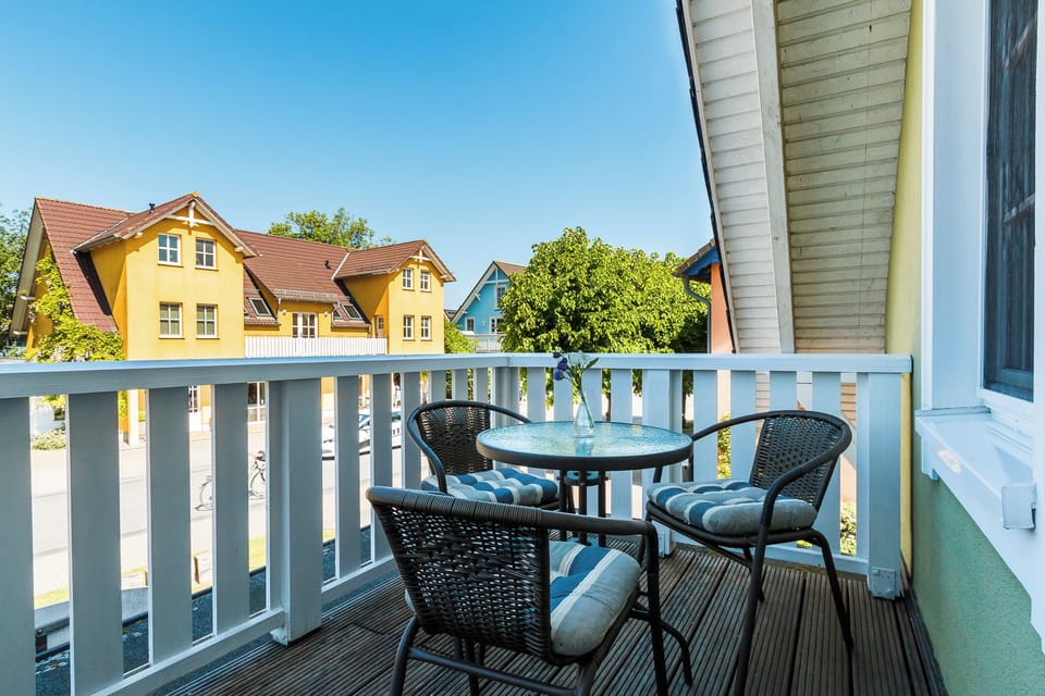 Balcony with Table and Chairs