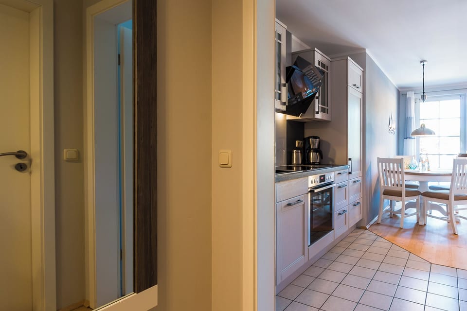Modern Kitchen with Dining Table and Appliances