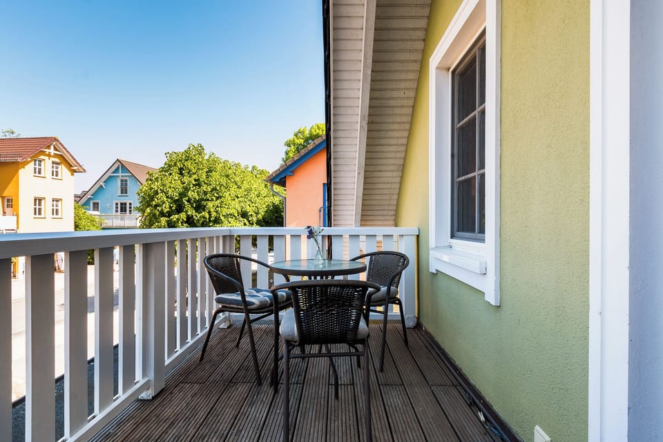 Balcony with Table and Chairs
