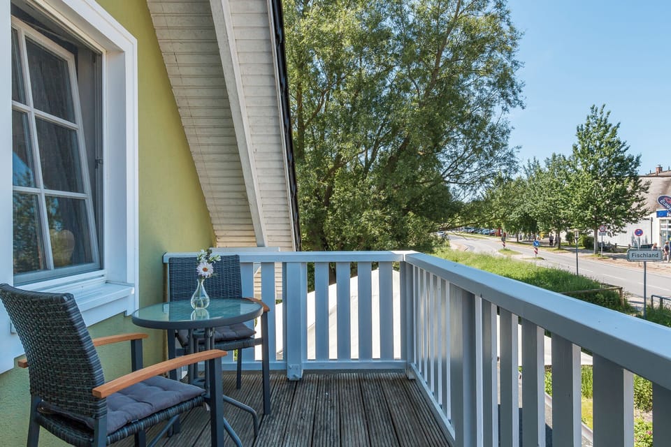 Balcony with a view of green surroundings