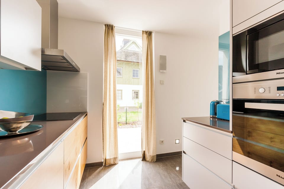 Modern Kitchen with Wood and Glass Elements