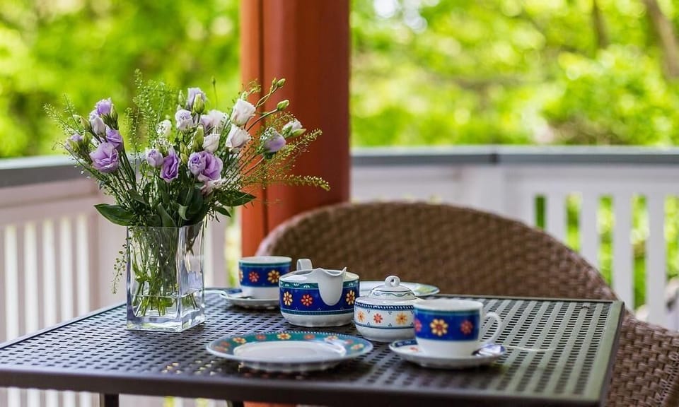 Terrace with Table and Flowers