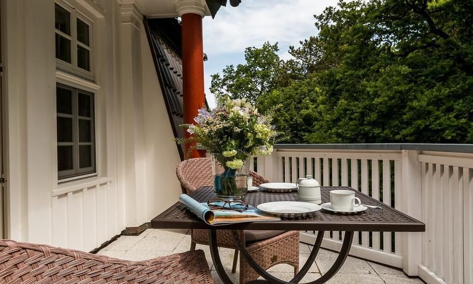 Balcony with Table and Comfortable Chairs