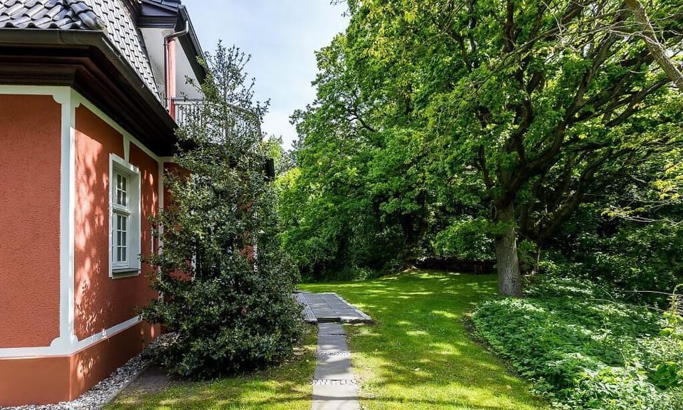 Exterior view of a charming building with garden