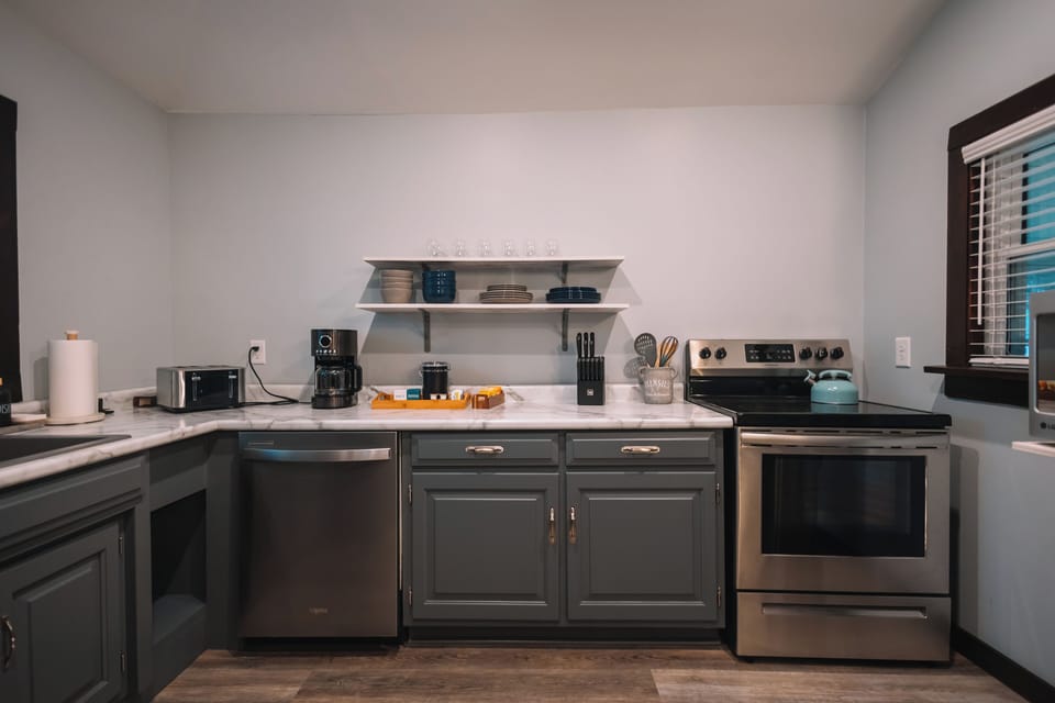 The large kitchen is located next to the living room so that no-one has to miss out on the fun!