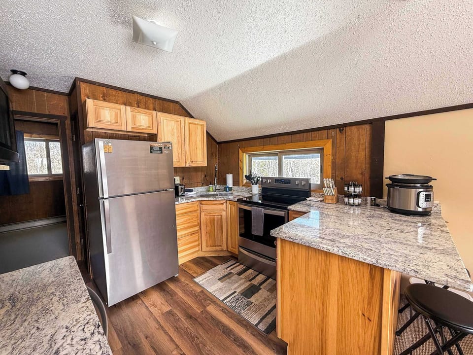 Our full kitchen also features a breakfast bar