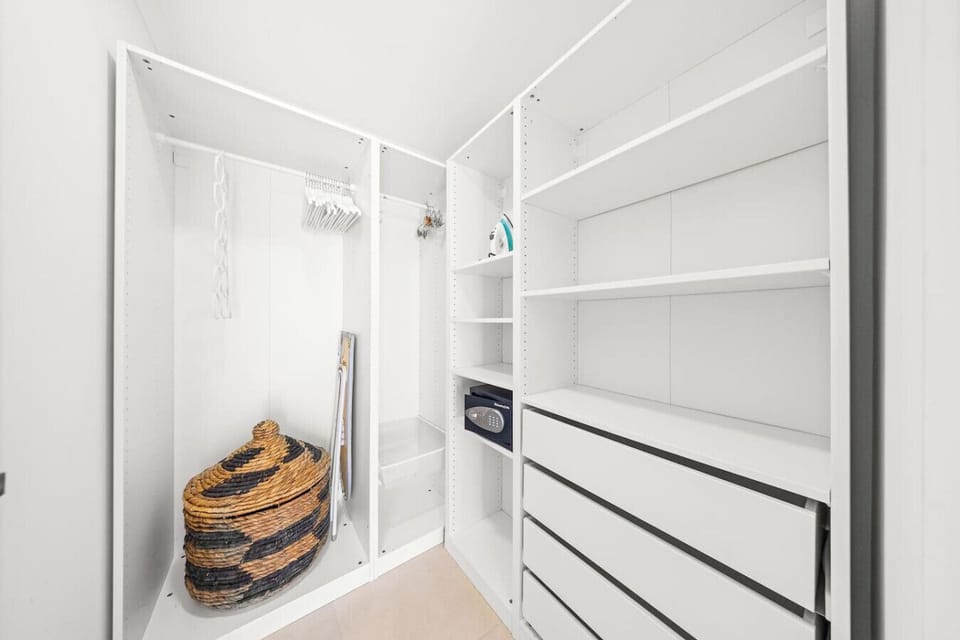 Organize with ease in a spacious walk-in closet.