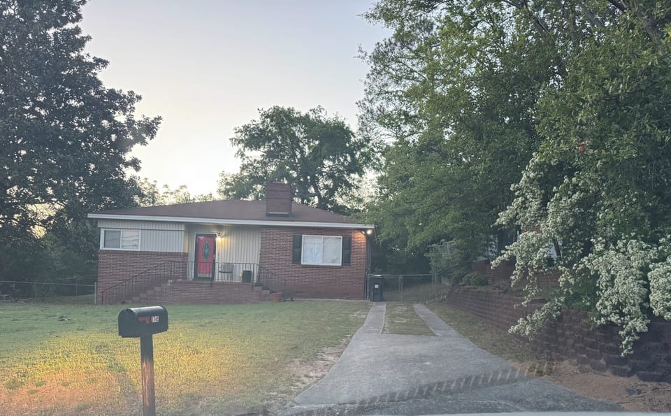 Street View. Nice size front and back yard with gate. 