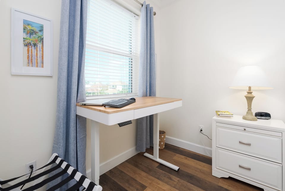 King Master Suite with access to the balcony.
