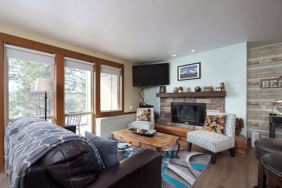 Unwind in the cozy living room & stream your favorites on the smart TV