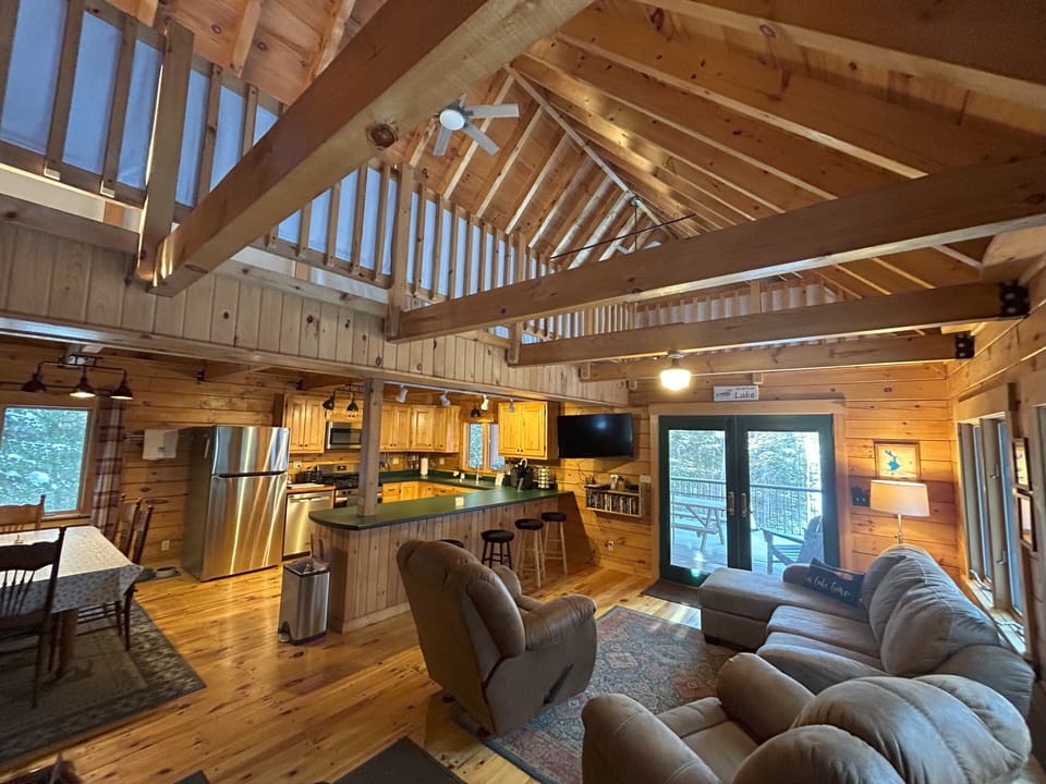 Home is cozy & open concept (upstairs lofts connected by catwalk)