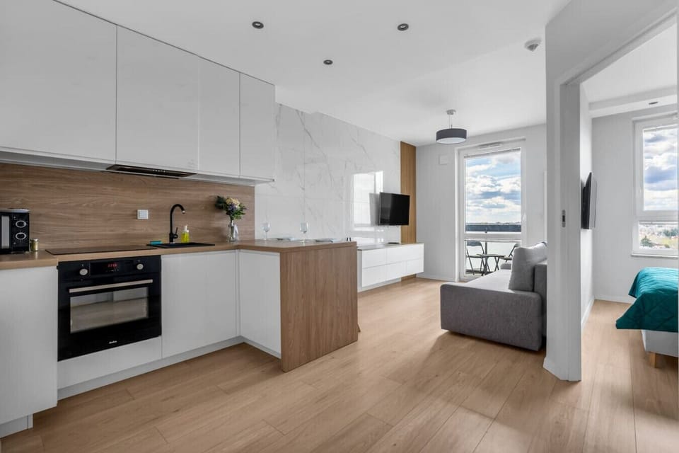 Main Living Area - Big Smart-TV for Your Entertainment | Book Now with RENTUJEMY.COM