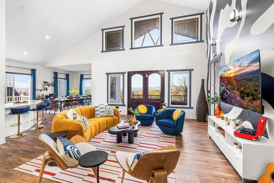 Bask in the picturesque views, custom mural artwork, and uniquely designed decor