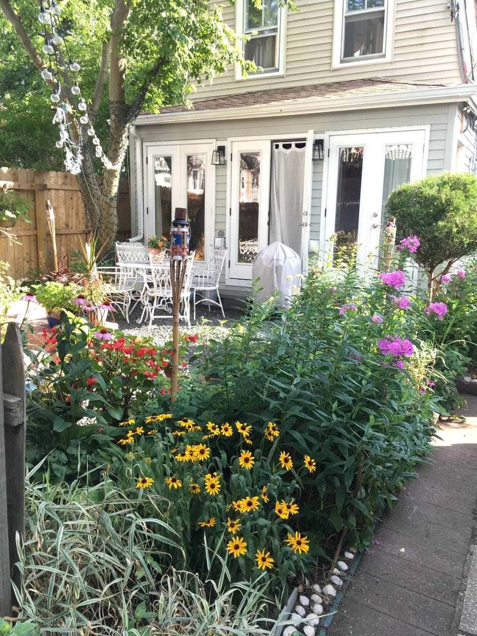 Approaching the house with private garden patio