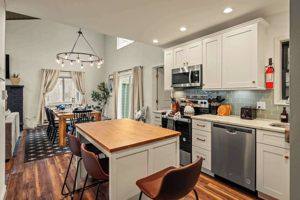 A stylish, open kitchen and dining space perfect for family meals and conversations.