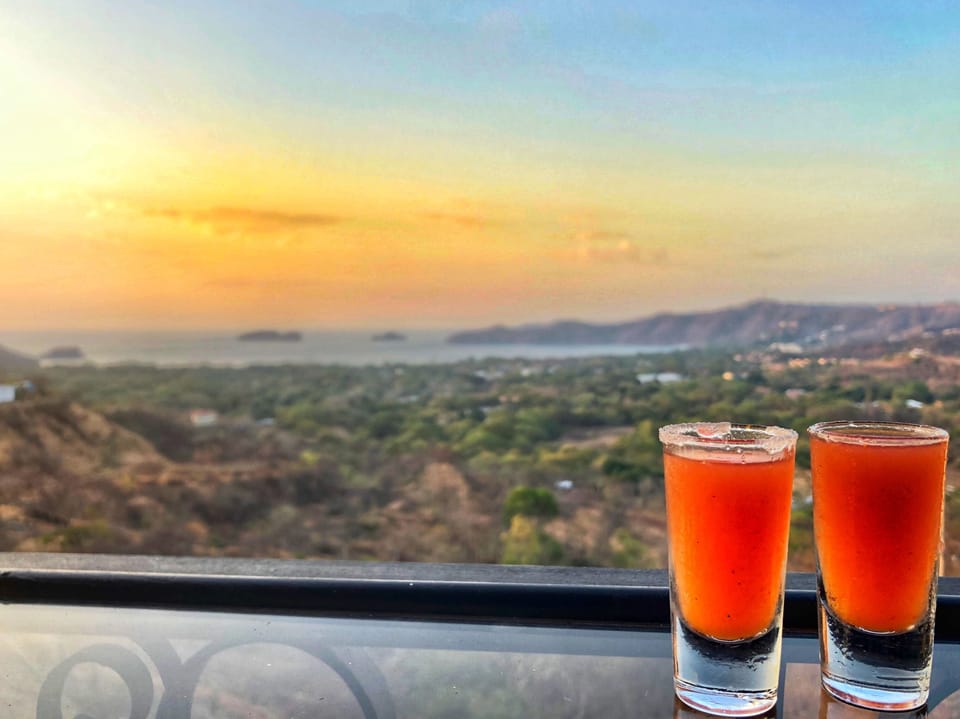 Chili Guaro shots are the unofficial drink of Costa Rica.  Each restaurant makes them a little differently - thick with tomato or thin with lime juice - they all have a bit of heat.  