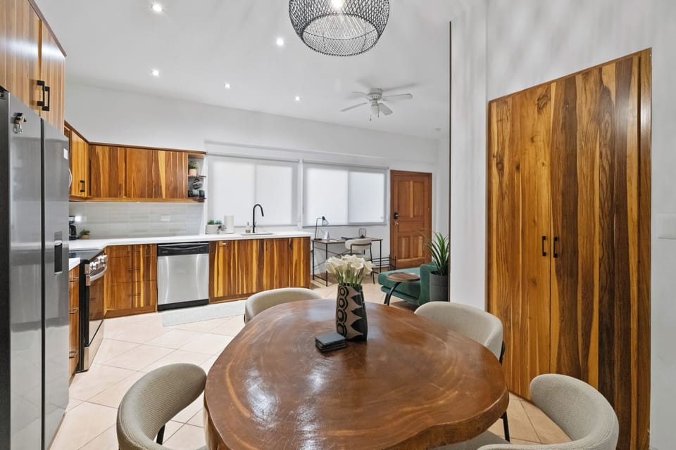 Dine in or host a games night around the locally sourced wood dining table.