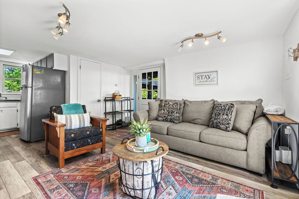 Living room with fireplace and queen sleeper sofa