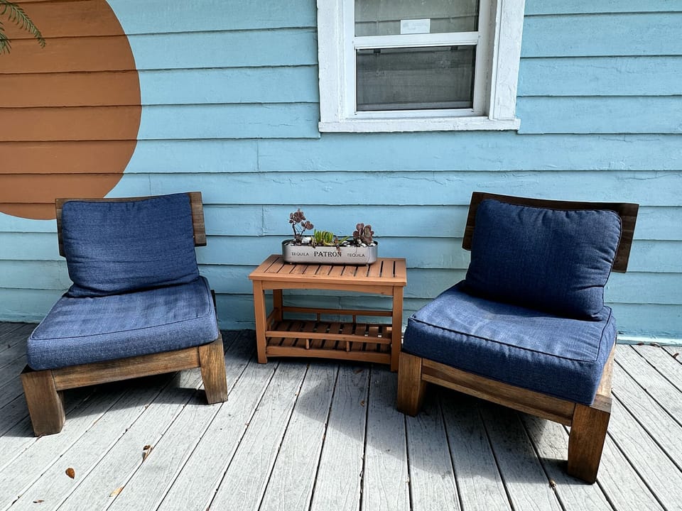 Private patio area with comfortable outdoor seating.