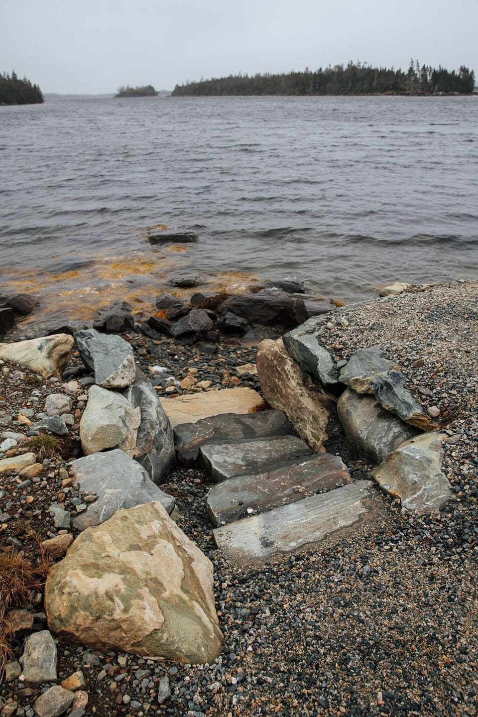 Stone stairs to beach area - there is a secondary fire pit by the beach