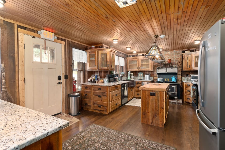 Self serve kitchen and a guest refrigerator
