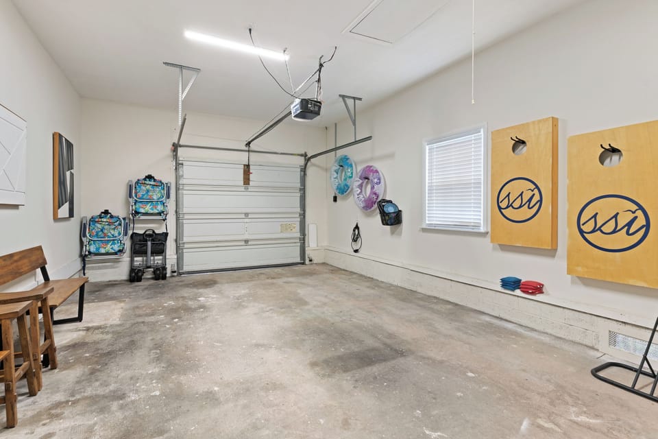 Single car garage with EV charger and included beach chairs (4), wagon, & games