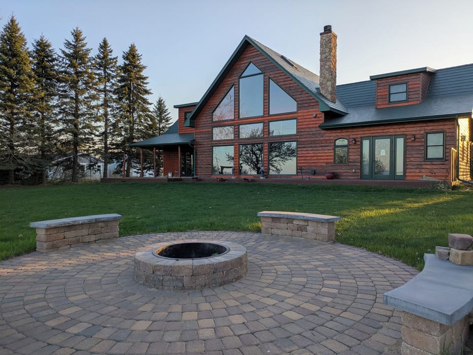 Large yard to hang out in on the lake side of the property.