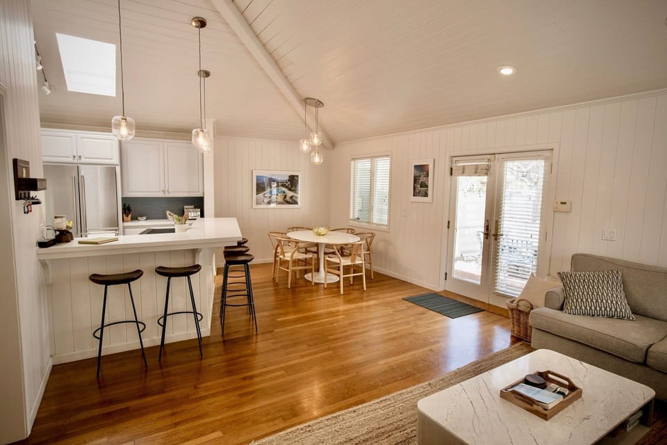 This open-concept living and dining area is designed for effortless vacation living.