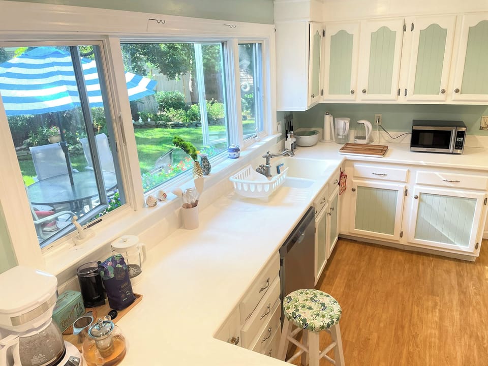 Kitchen with Coffee and Tea Station Overlooking the Garden
