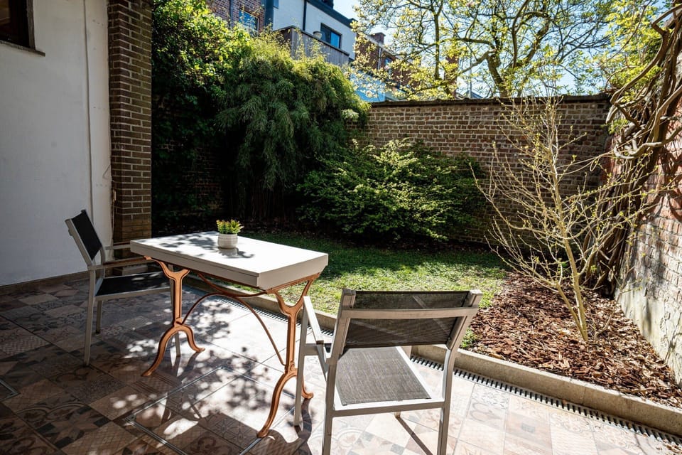 Cozy terrace surrounded by greenery — your private retreat.
