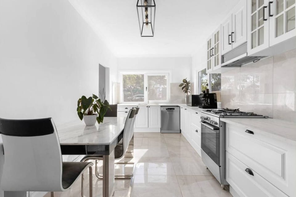 Dining table and fridge.