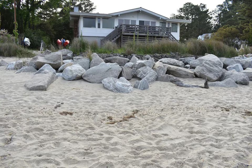Private waterfront setting with direct access to the shoreline