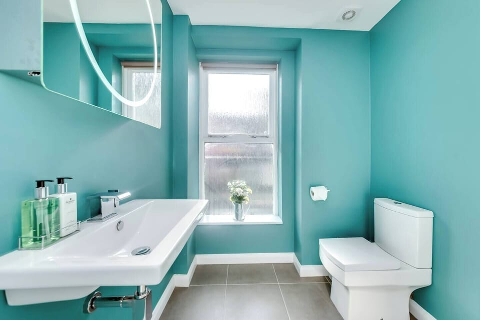 Bright and well appointed en suite.