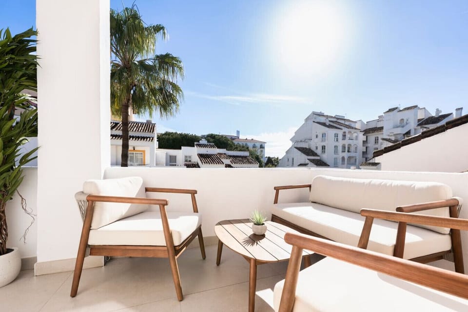 Sunny terrace with pool, mountain and sea views