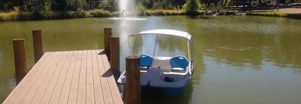 Paddle Boat available for the 1 acre pond and feed the 25 Large Koi & Turtles