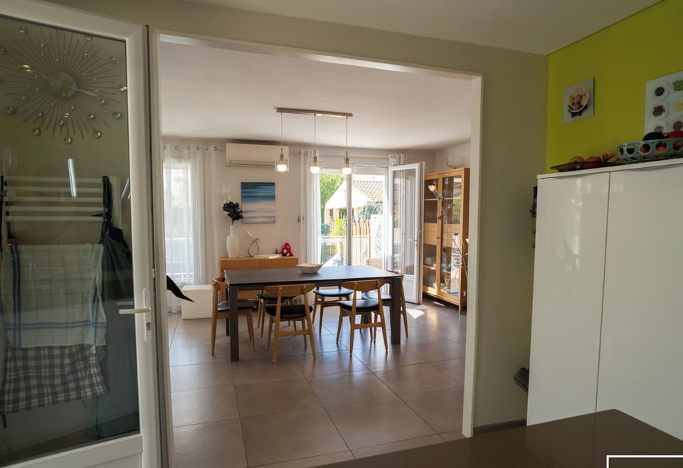 Fitted kitchen opening onto the conservatory and living room