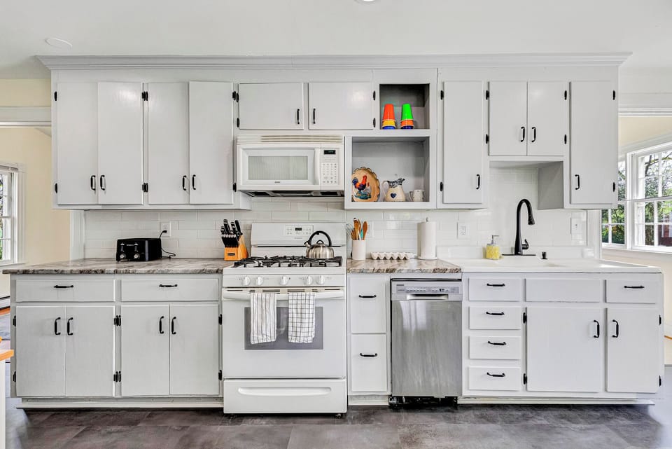 Charming Kitchen: Cook up a storm with modern appliances and bright natural light!