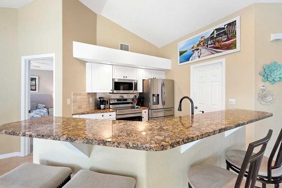 Kitchen with Bar for Additional Seating