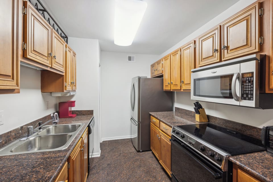 Fully stocked kitchen and stainless steel appliances